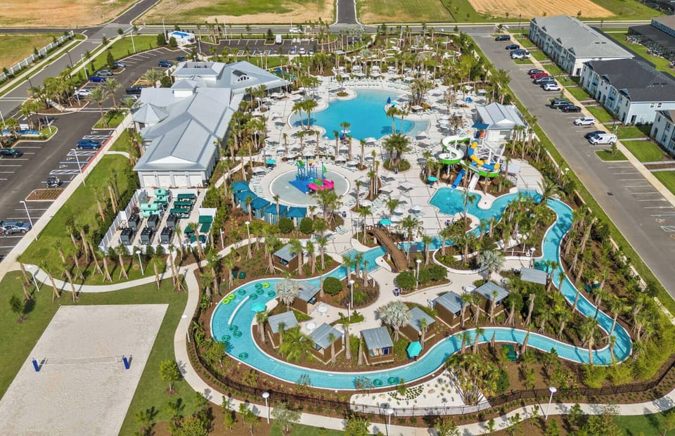 Relax at our vibrant resort-style pool area with multiple pools and a winding lazy river. Surrounded by lush landscaping and colorful lounges, it’s the perfect place for fun in the sun with family and friends.
