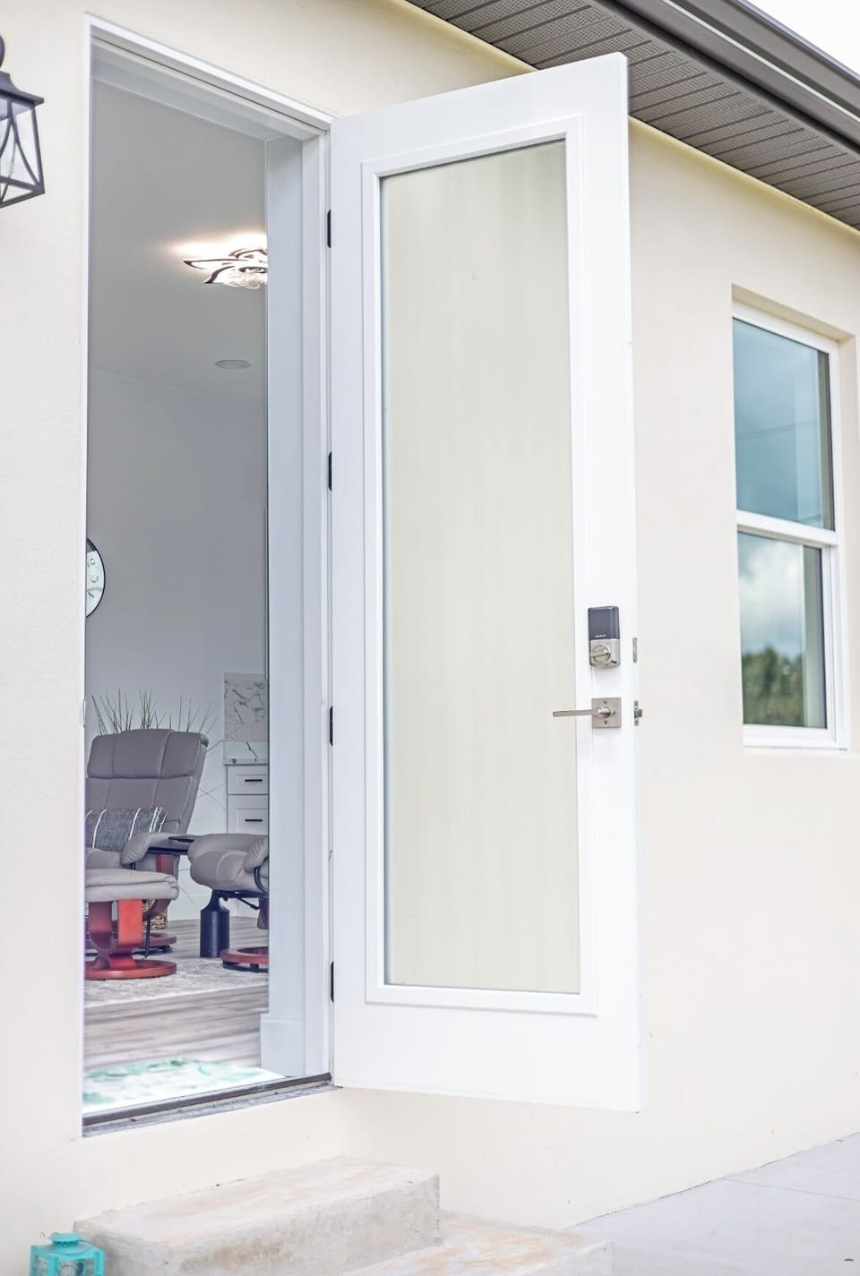 Entrance is on the right side of the house. 
