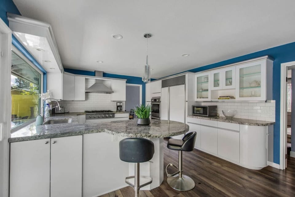 Kitchen with bar seating.