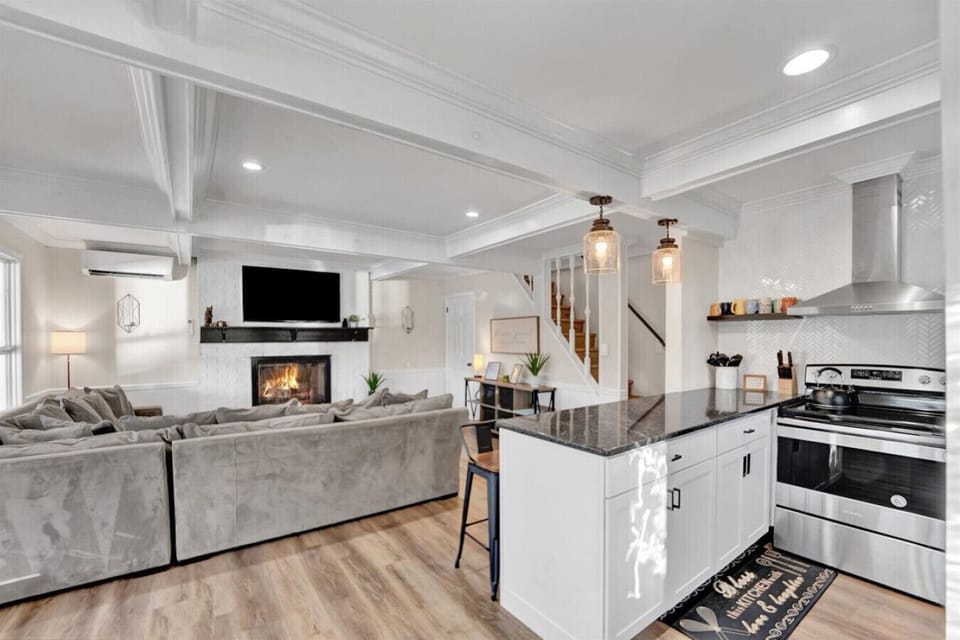 Welcome to the kitchen! Featuring a spacious peninsula with extra seating—perfect for cooking, chatting, or enjoying a casual meal.