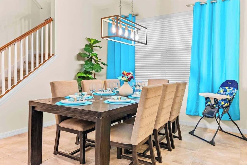 Dining area with high chair ready for the littlest traveler.