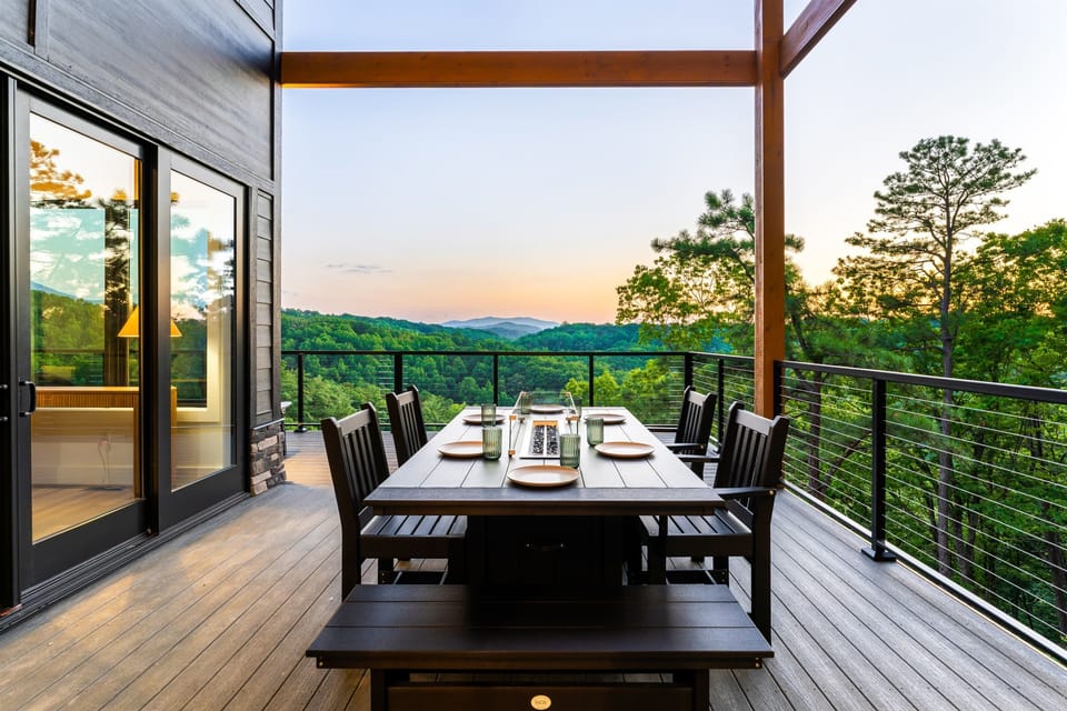 Enjoy sunset dinner on the deck at our outdoor fire pit table.
