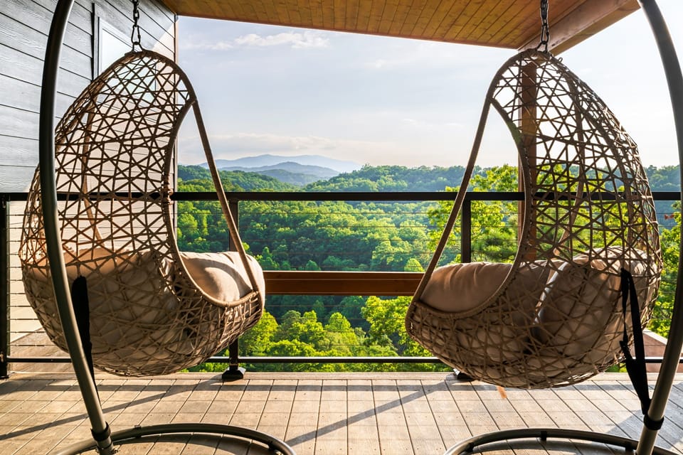 Sway in a hanging egg chair and soak up the breathtaking mountain landscape from the deck.