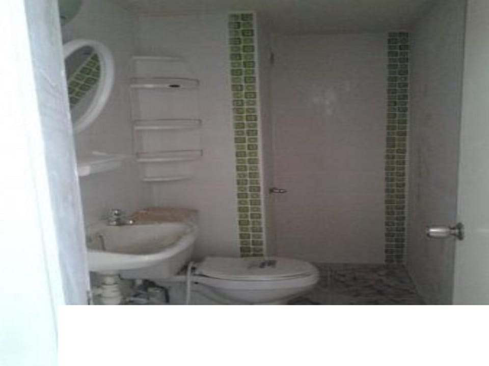 Shower, free toiletries, slippers, towels