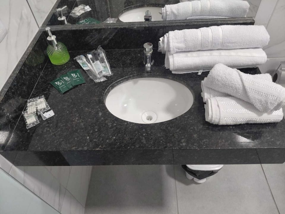 Family Triple Room | Bathroom | Towels, soap, shampoo, toilet paper