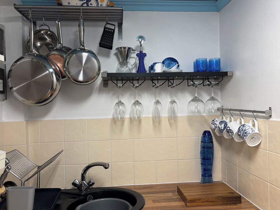 Well equipped galley kitchen with Cornish designed pieces