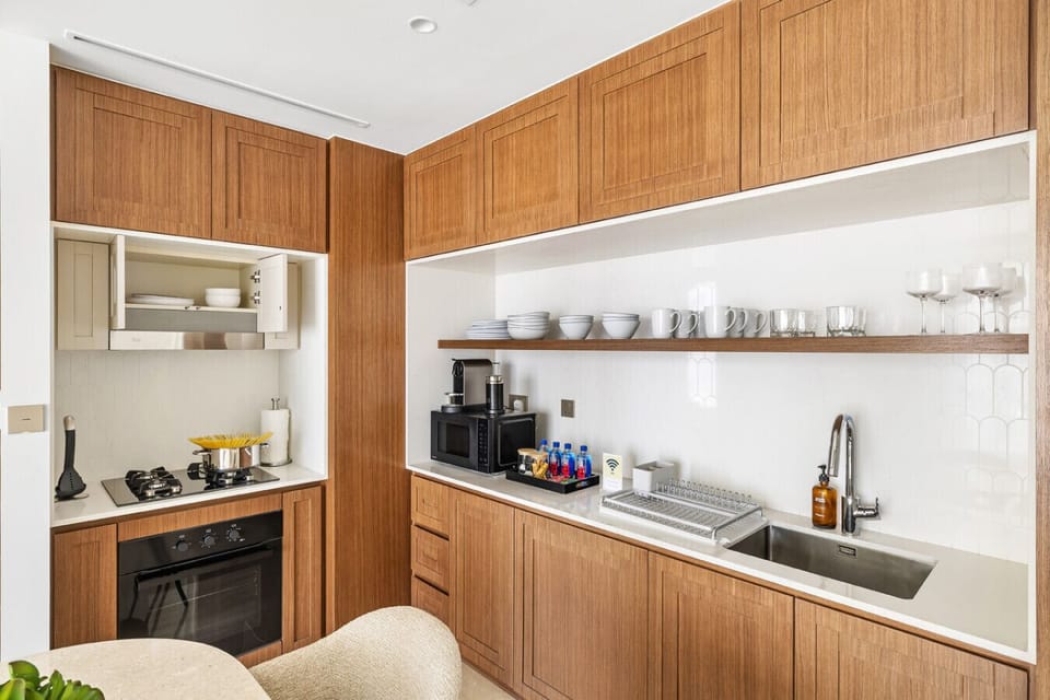 Bright modern kitchen with well organized utensils