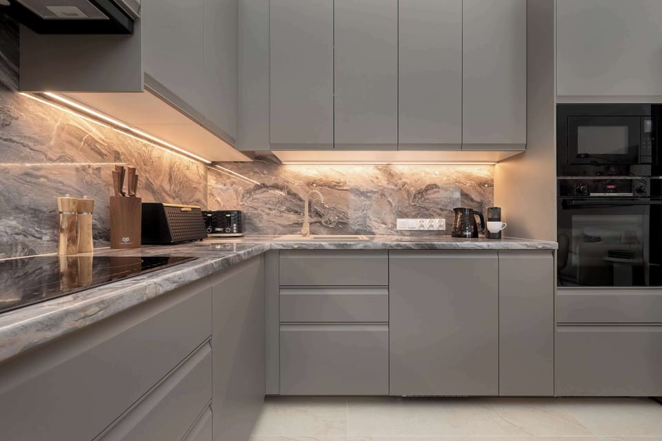 The kitchenette's practical layout maximizes space and functionality.