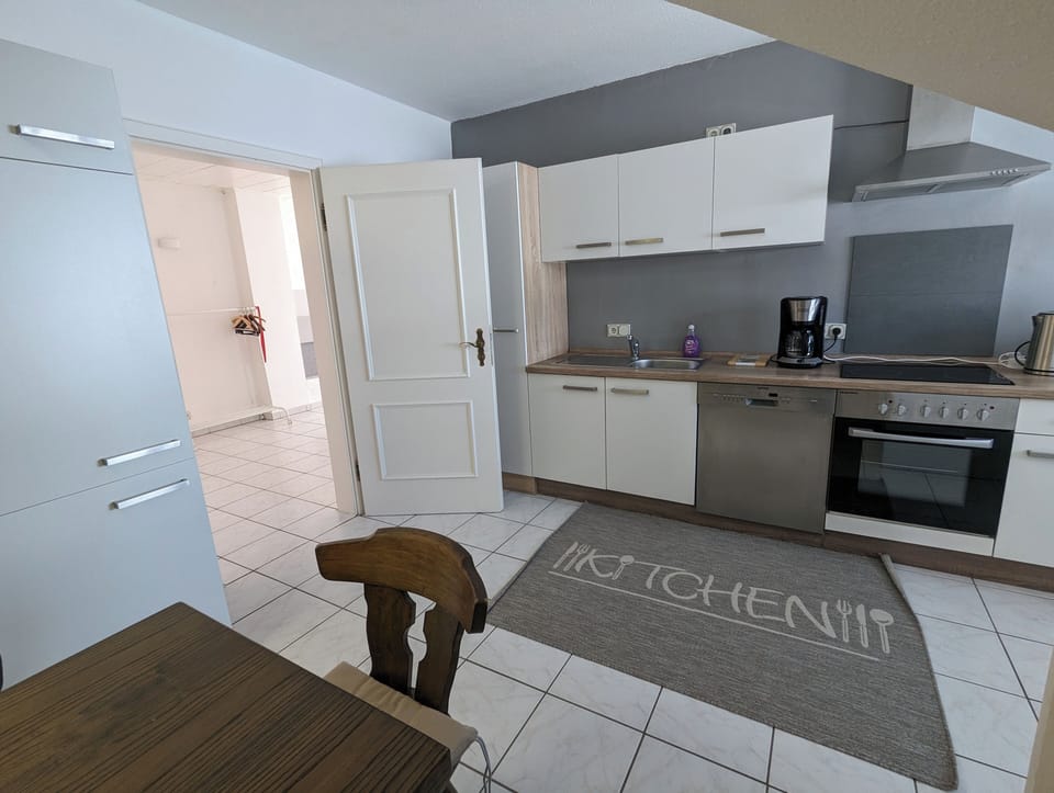 Family Apartment, 2 Bedrooms, Kitchen | Private kitchen | Highchair