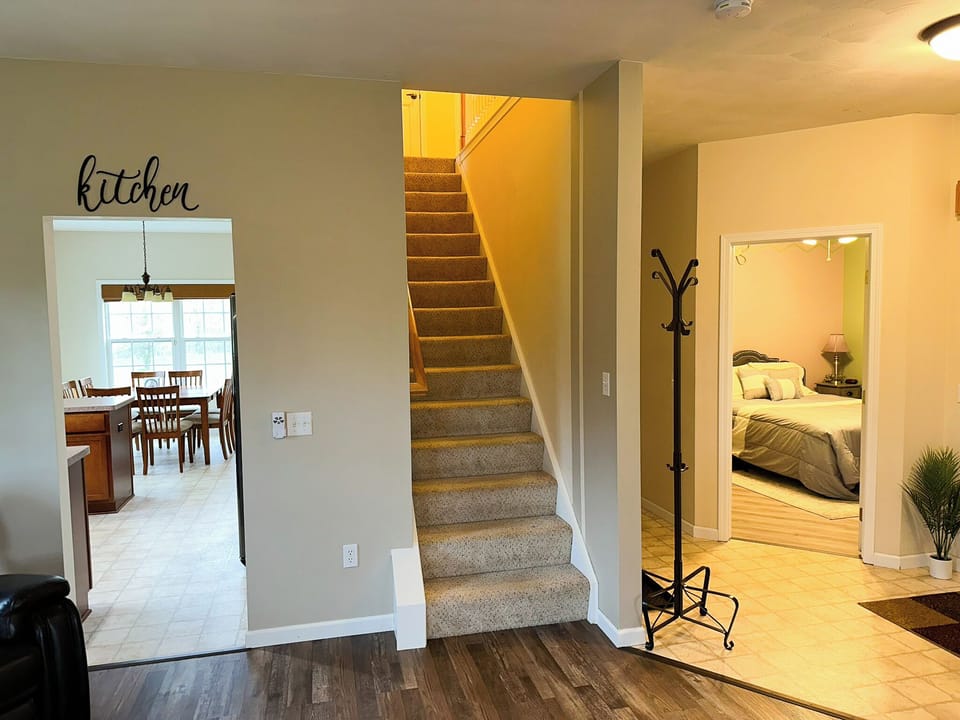 ground floor bedroom; stairs to 2nd floor
