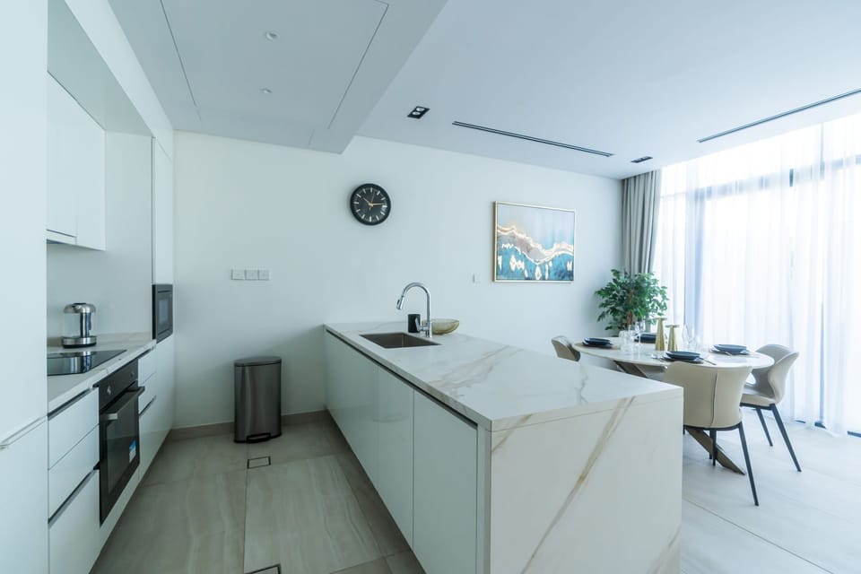 Deluxe Townhome, Balcony | Private kitchen | Coffee/tea maker, electric kettle
