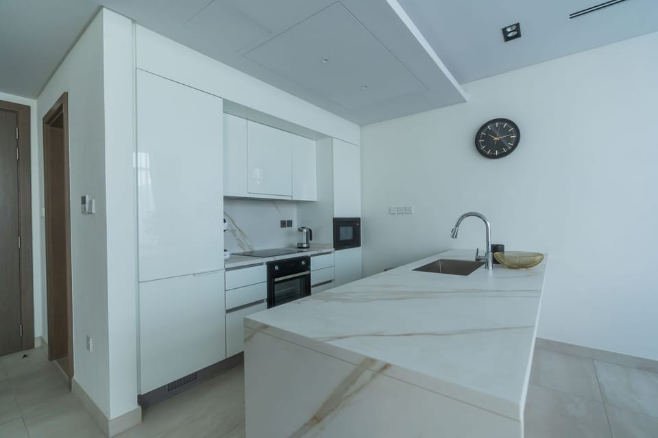 Deluxe Townhome, Balcony | Private kitchen | Coffee/tea maker, electric kettle