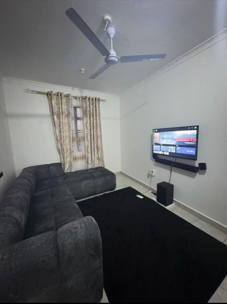 Comfort Apartment | Living area | 32-inch Smart TV with digital channels