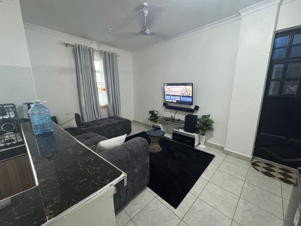 Comfort Apartment | Living area | 32-inch Smart TV with digital channels
