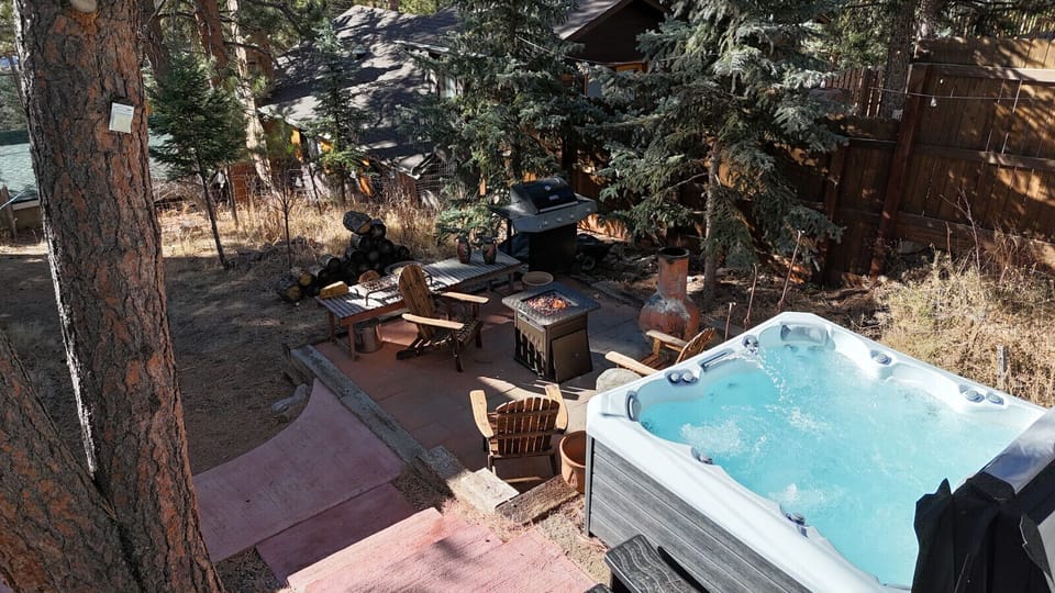 Aerial view of the hot tub and fireplace