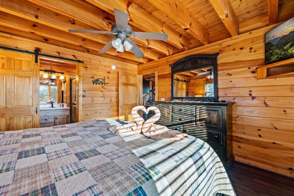 Stretch out on the bed, watch your favorite shows, or just take in the peaceful cabin vibes from your cozy suite.