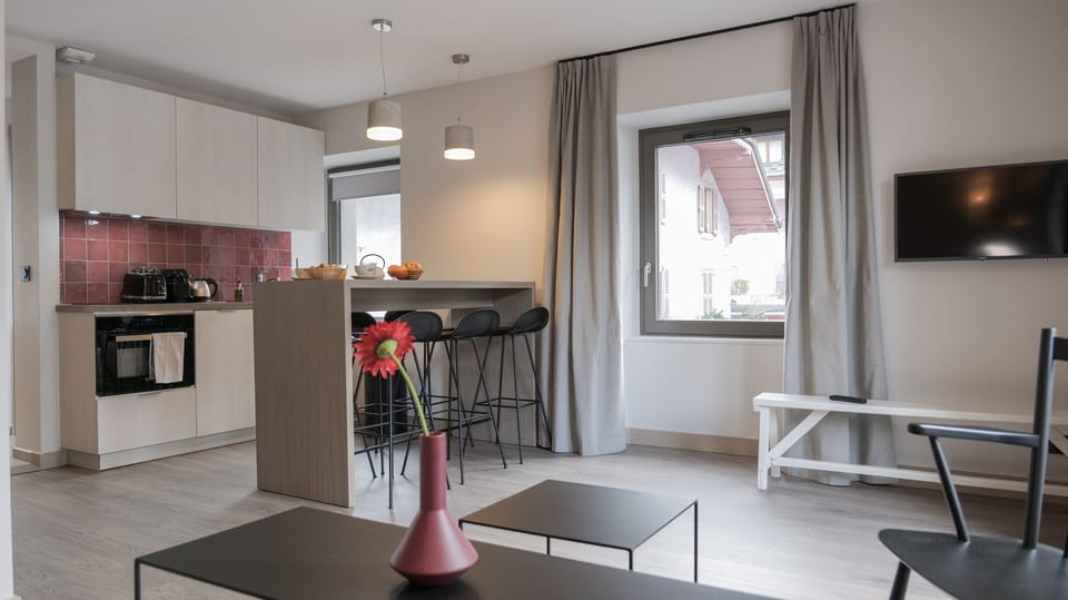 Family Duplex, 2 Bedrooms, City View | Living area | Flat-screen TV