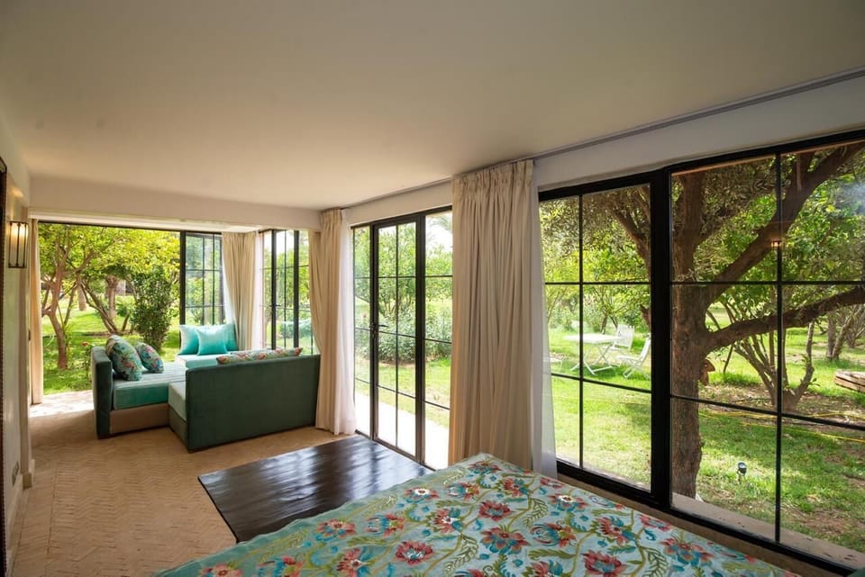Comfort Suite, 1 Bedroom, Housekeeping, Pool View | In-room safe, desk, blackout drapes, soundproofing
