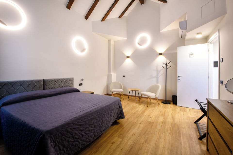 Family Room | Minibar, in-room safe, desk, free WiFi