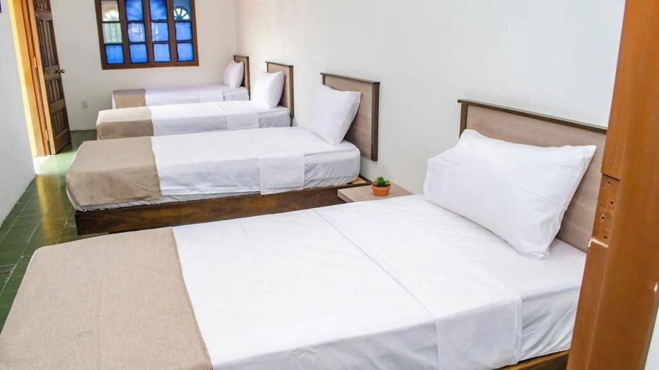 Deluxe Quadruple Room, Courtyard View | Desk, soundproofing, WiFi (free)