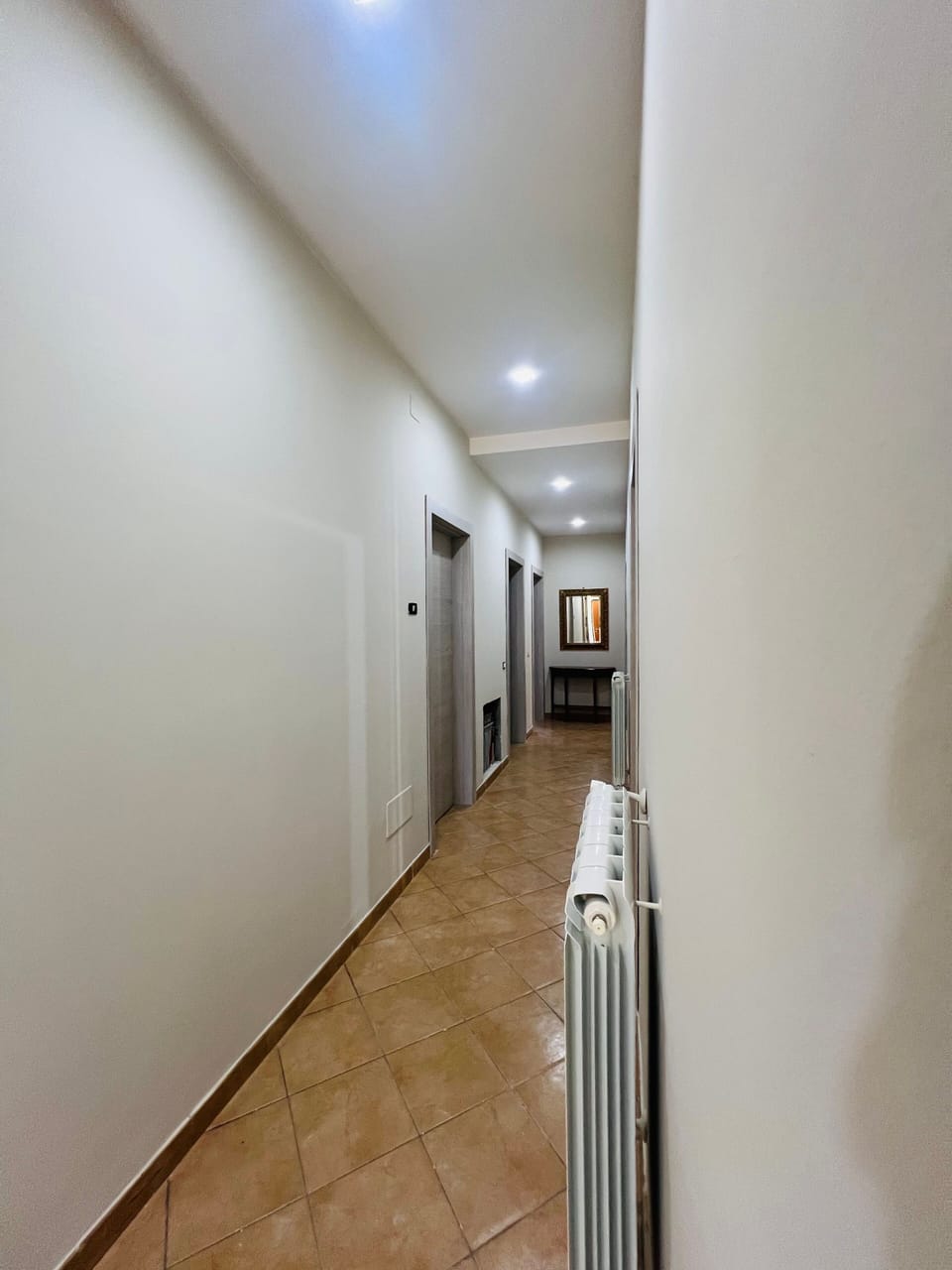 Deluxe Room, Garden View | Living area | Flat-screen TV