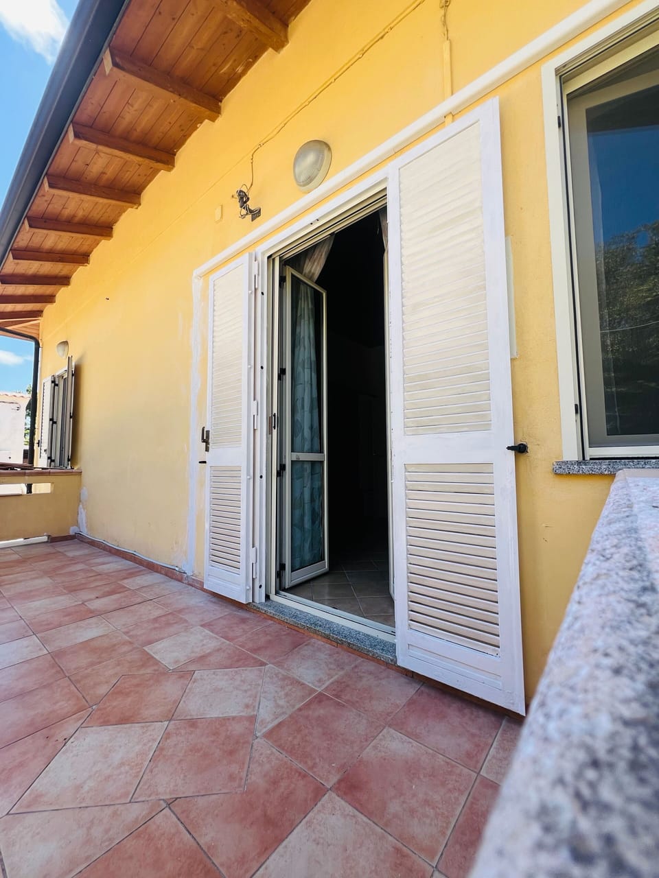 Deluxe Room, Garden View | Terrace/patio