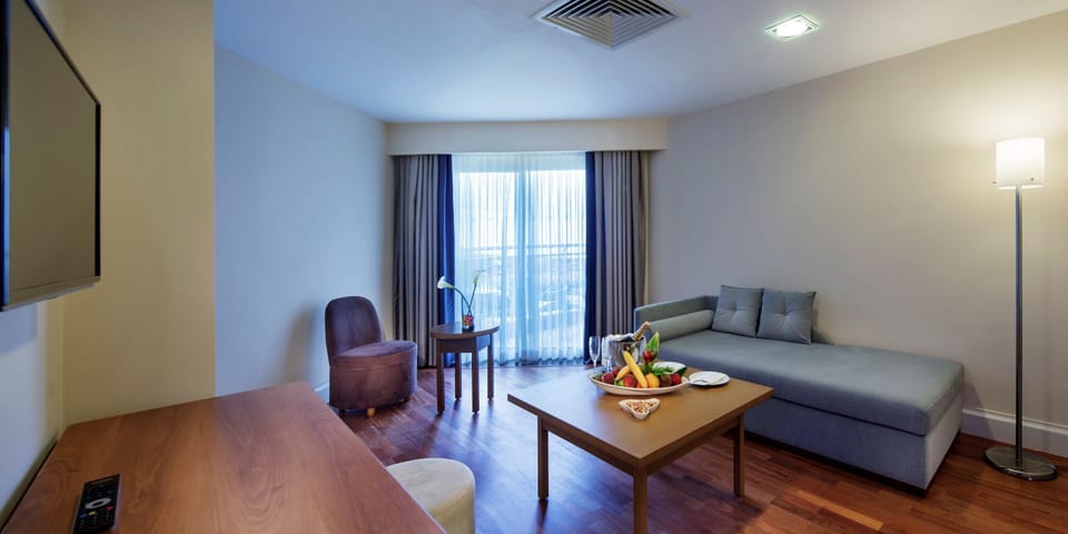 Family Room | Free minibar, in-room safe, rollaway beds, free WiFi