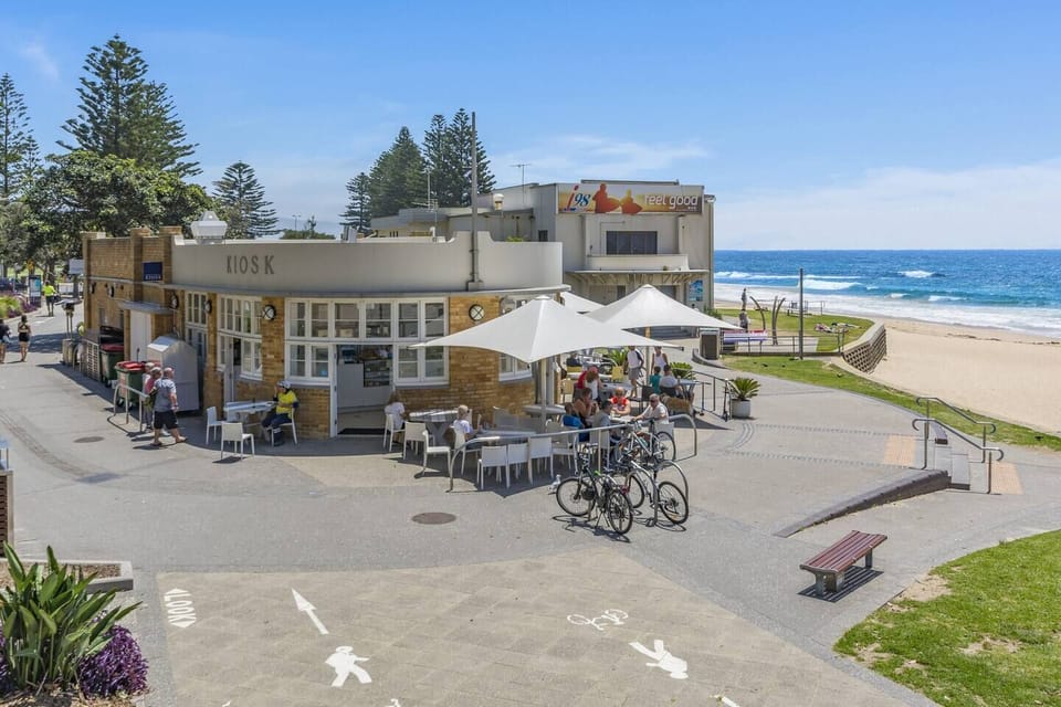 Start your day at Wollongong Beach, where local cafés and seaside paths meet golden sands and ocean views just moments from the shoreline.
