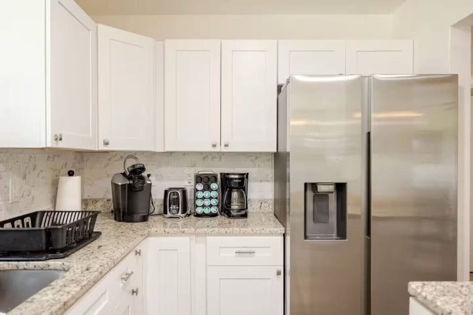 Create unforgettable meals in this beautifully designed, fully equipped kitchen. Gather your group to savor delightful dining experiences in the elegant dining area or at the inviting kitchen bar seating.