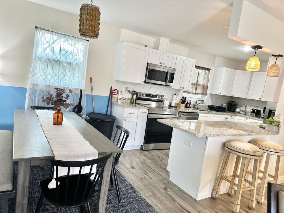 Create unforgettable meals in this beautifully designed, fully equipped kitchen. Gather your group to savor delightful dining experiences in the elegant dining area or at the inviting kitchen bar seating.