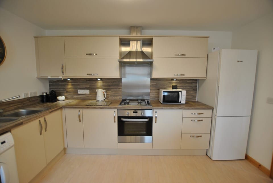 The kitchen has a fridge-freezer, microwave and oven to aid your self-catering stay