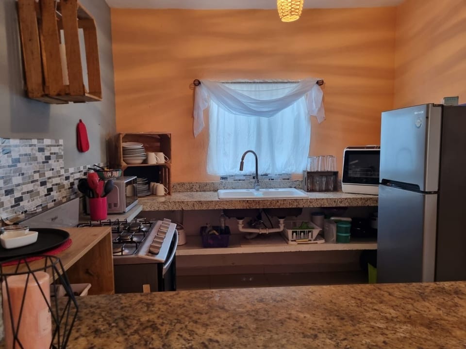 Fully stocked stainless steel kitchen