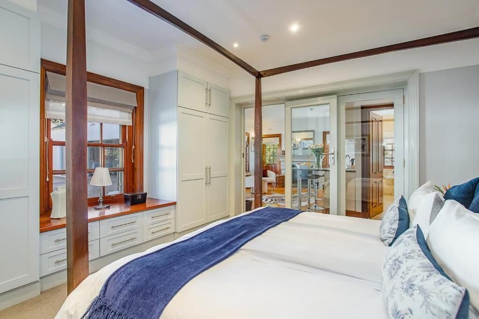 Deluxe Suite, Patio, Garden View | In-room safe, iron/ironing board, free WiFi