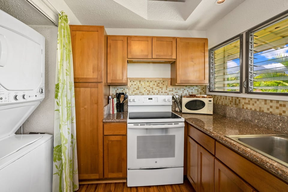 Full kitchen with washer and dryer