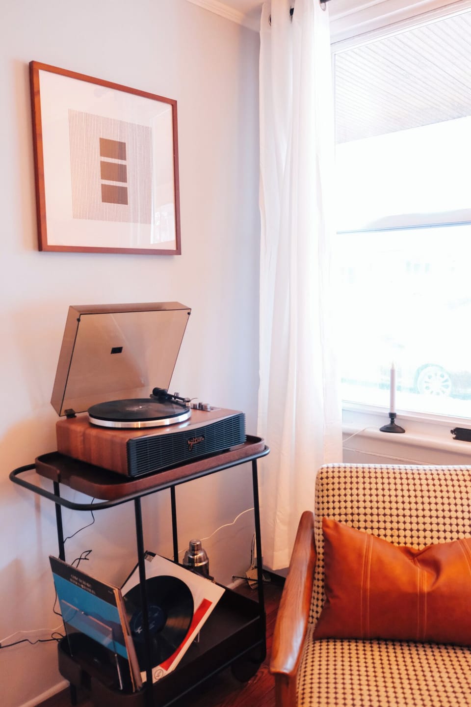 Cue up your favorite album on our vintage-style turntable.