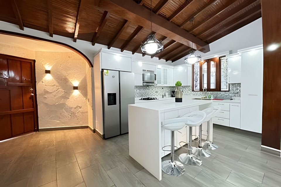 Villa | Private kitchen | Full-size fridge, microwave, oven, stovetop
