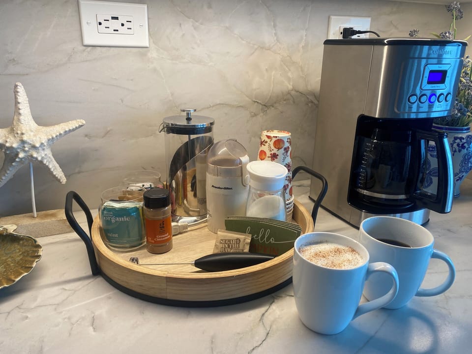 Coffee Bar with French Press, asst sugars, tea, bean grinder, whipper, cinnamon