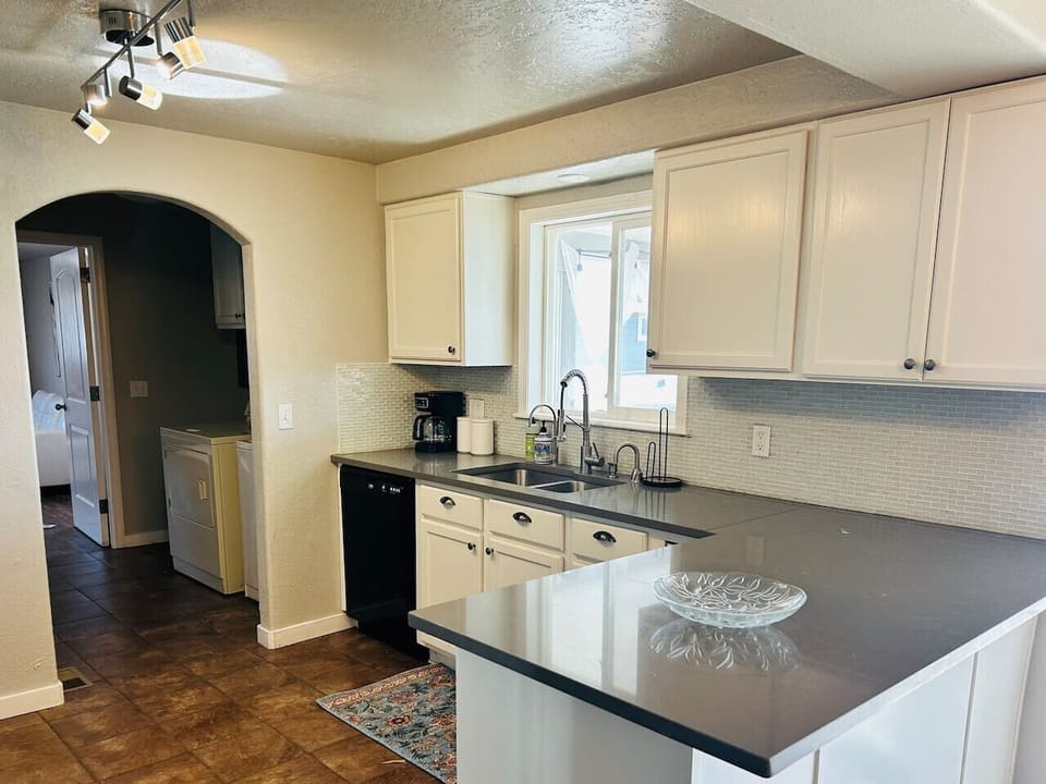 bright white kitchen with sprayer