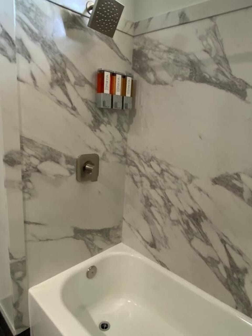 Deluxe Quadruple Room, 2 Queen Beds | Bathroom | Bathtub, hair dryer, towels