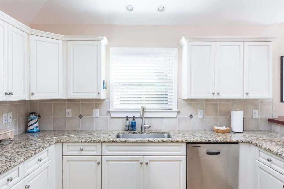 Top Level: Fully-stocked Kitchen featuring stove, refrigerator, oven, microwave, toaster, drip, Keurig, blender, hand mixer and much more