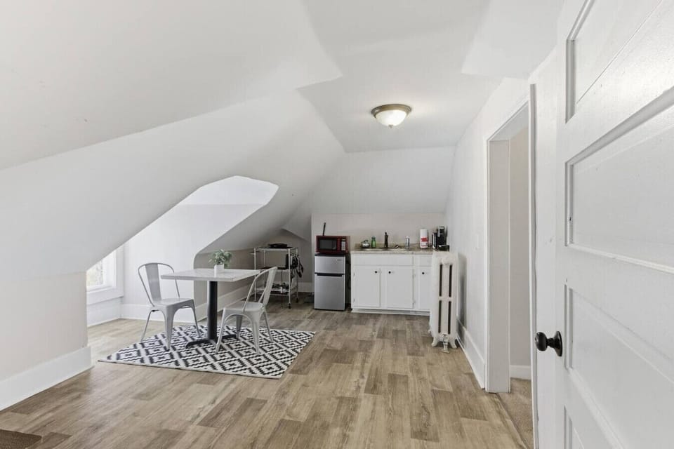 Enjoy meals or coffee in this bright loft nook with plenty of space to relax and unwind.