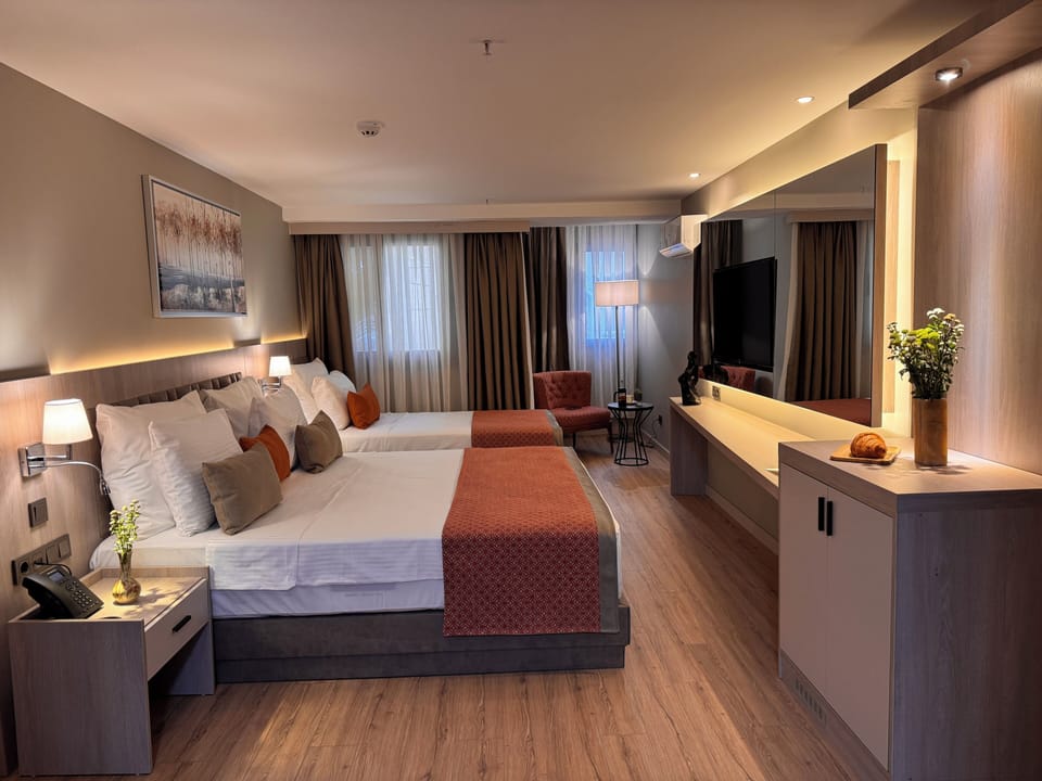 Family Room | Down comforters, Select Comfort beds, minibar, in-room safe