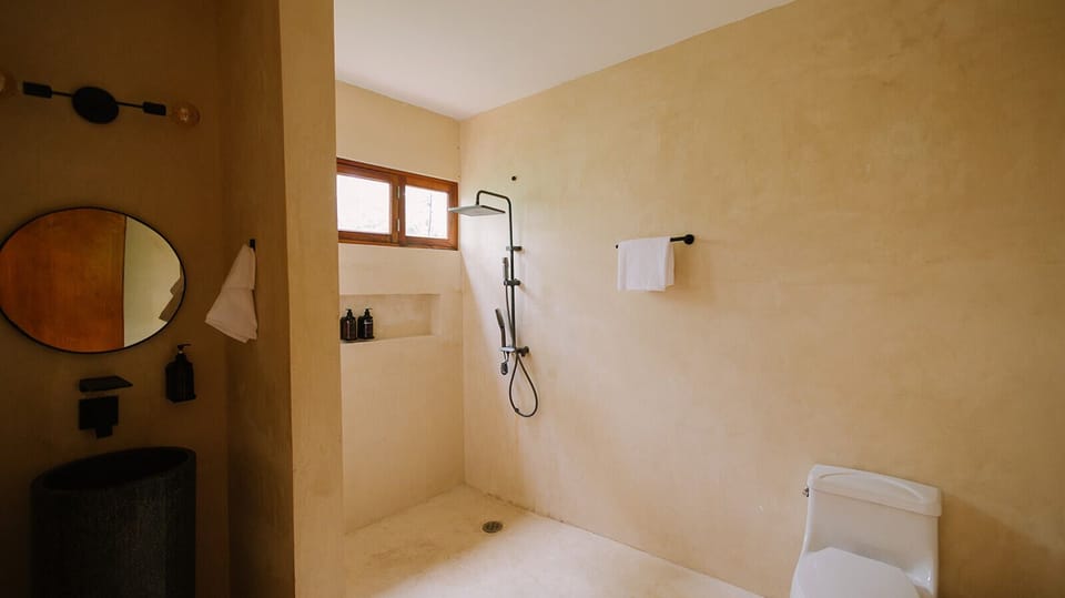Superior Suite, Balcony, Pool View | Bathroom | Hair dryer, towels, soap, shampoo