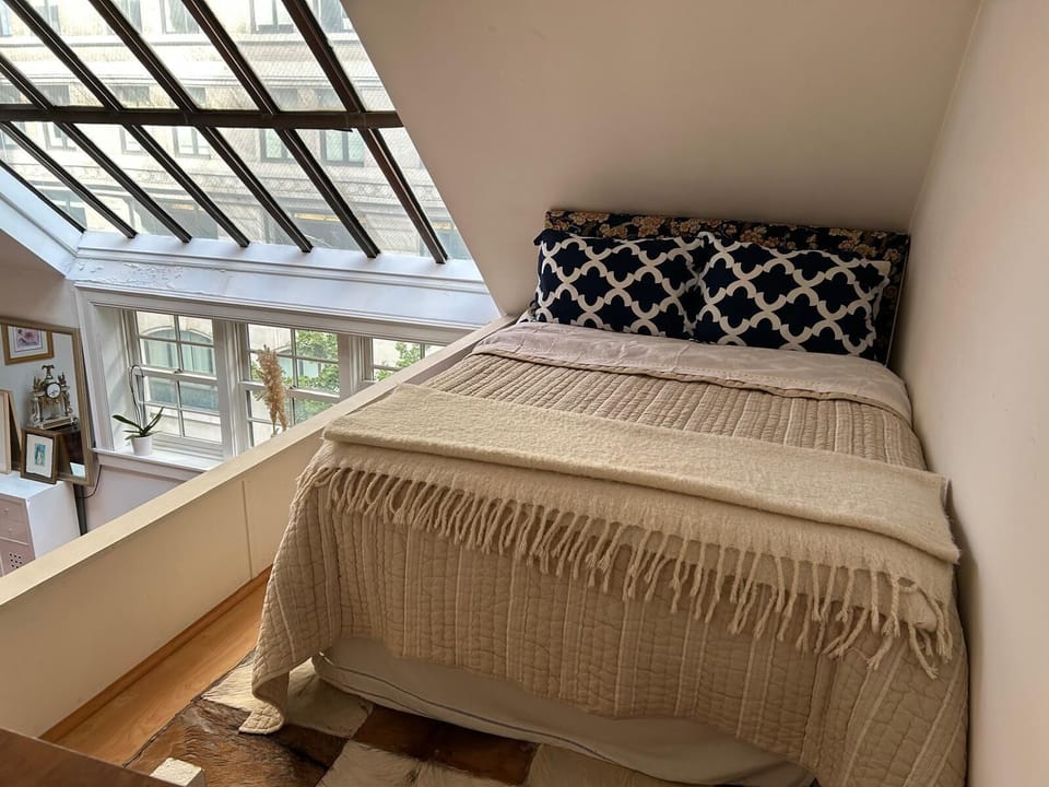 Bedroom loft overlooking living area