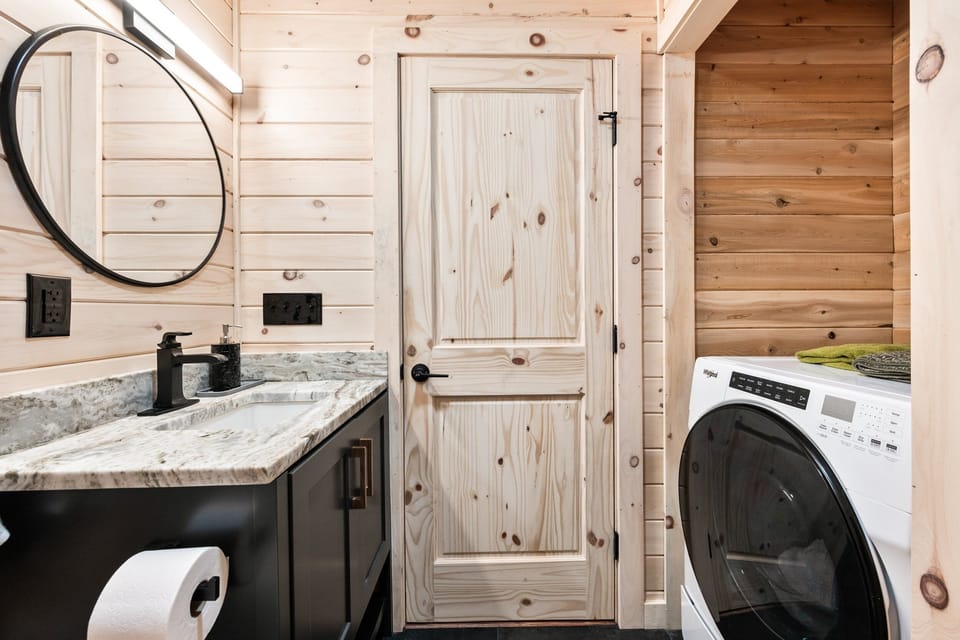 Bathroom #1 with laundry area