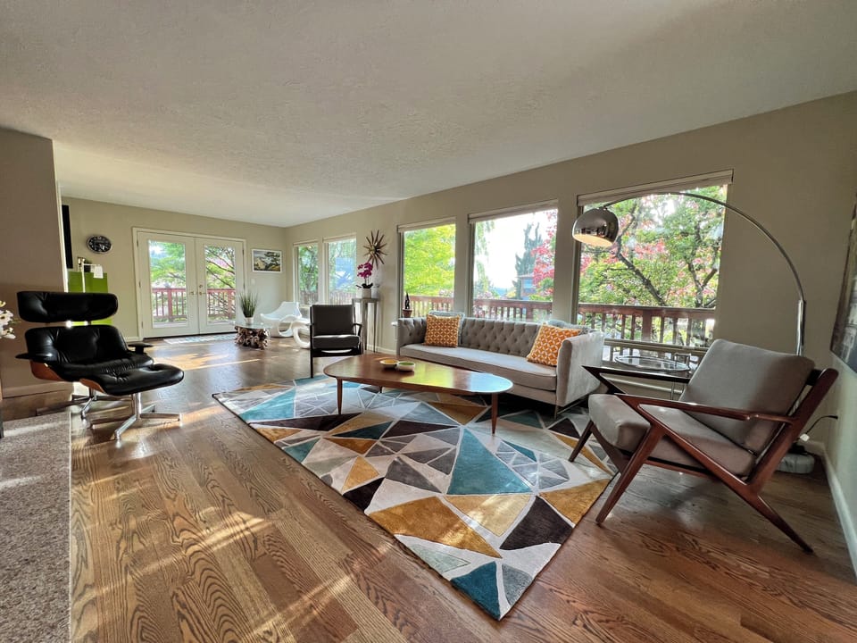 Main Level living room is a perfect area for story telling with family & friends