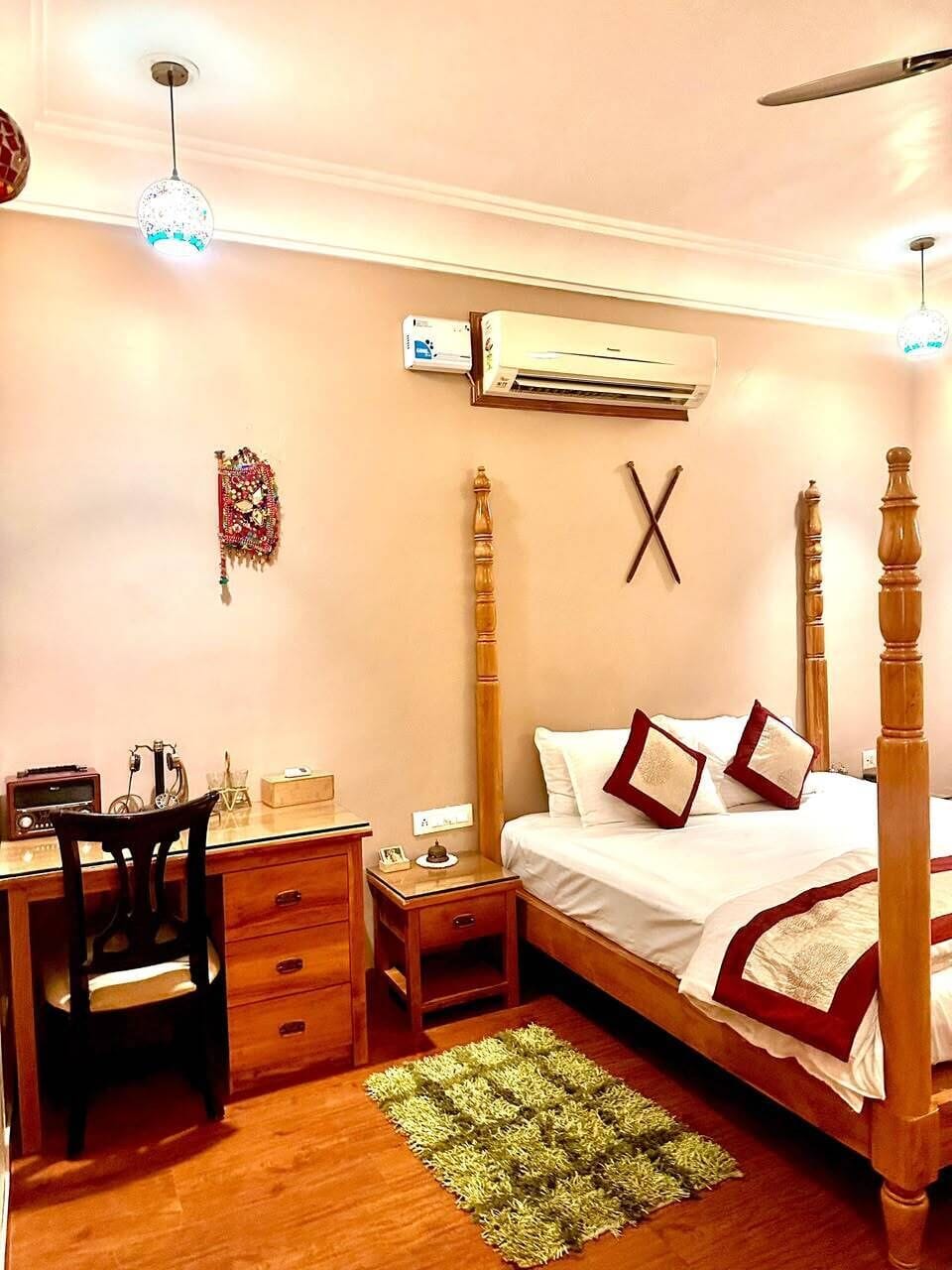 Premium bedding, desk, laptop workspace, soundproofing