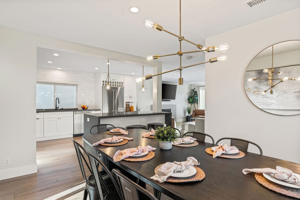 Unit 1: Dining table set with stylish pendant lighting.