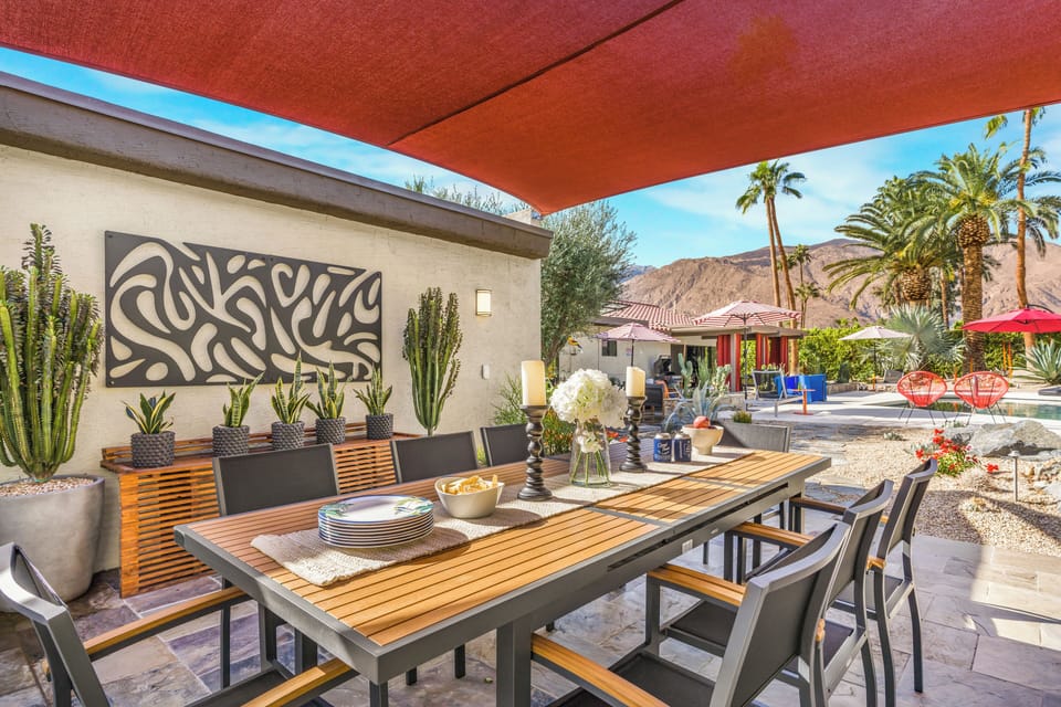 Backyard with outdoor dining table perfect for picnic.
