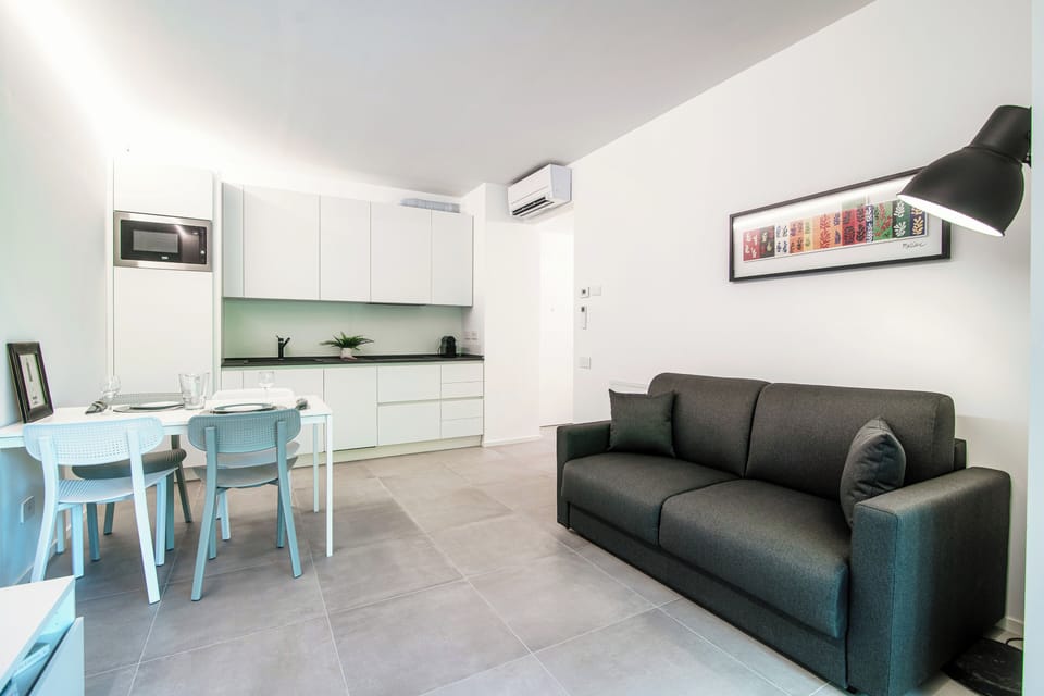 Apartment, Mountain View | Living area | 30-inch TV with digital channels